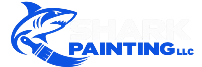 Shark Painting LLC logo featuring a blue shark and paintbrush icon with white and blue lettering on a transparent background